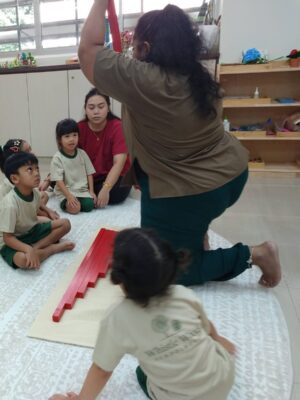 Children in group with teacher